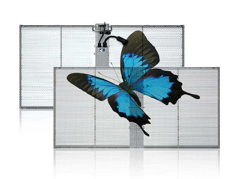 Rental transparent LED videowall serving as a concert stage backdrop, showing fast-lock cabinet structure and lighting effects passing through.