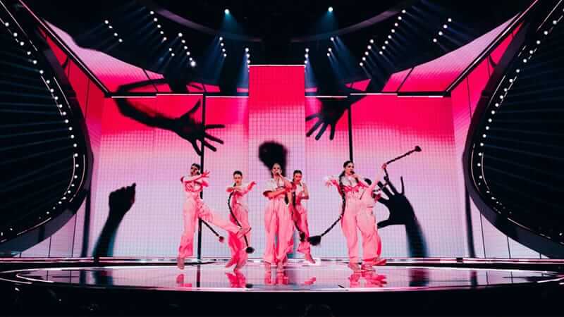 rental LED screen forming a curved cube backdrop for music event